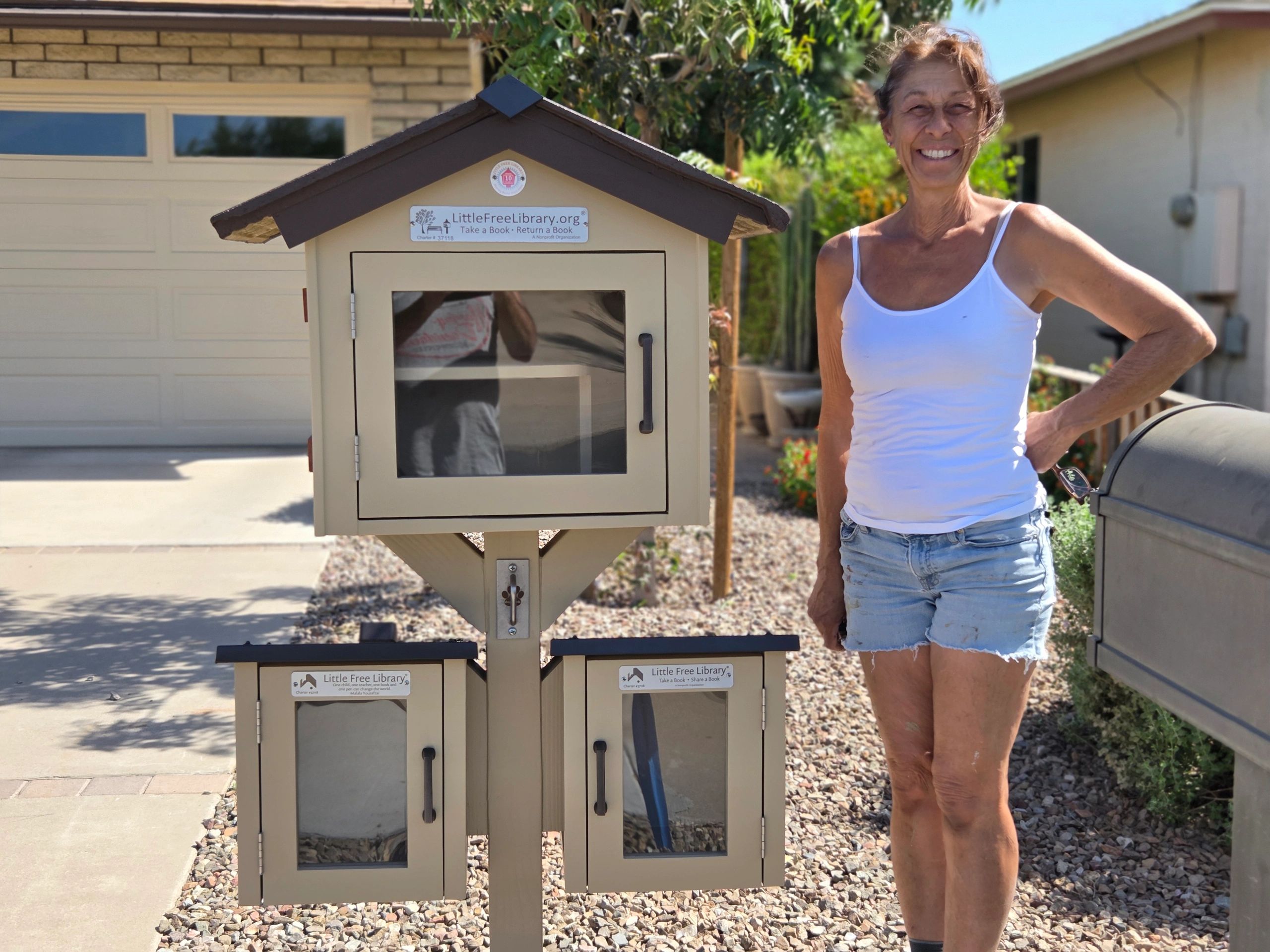 Toni with Little Free Library remodel project